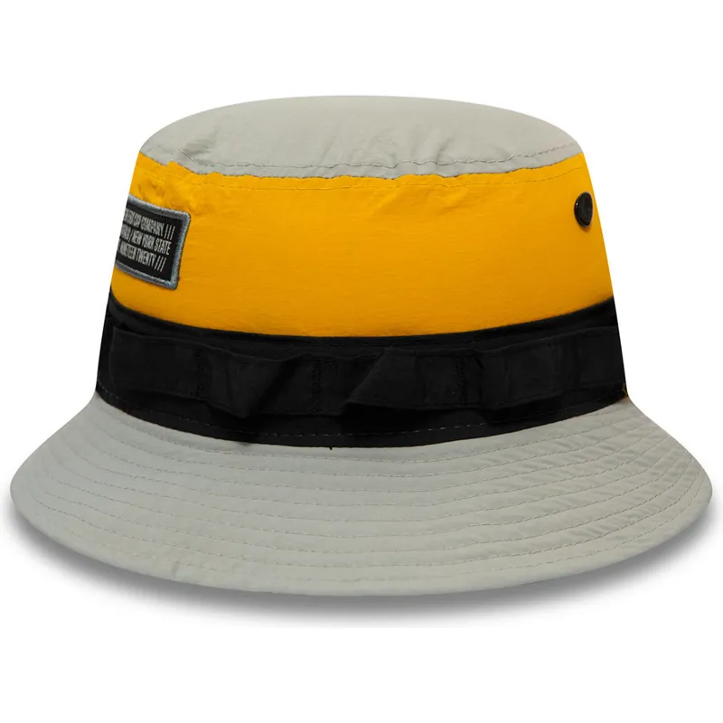wiadra-szary-bucket-gris-negro-y-amarillo-panelled-adventure-new-era