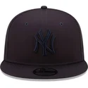 granatowa-czapka-z-daszkiem-snapback-z-granatowym-logo-9fifty-league-essential-new-york-yankees-mlb-od-new-era
