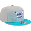 szara-i-niebieska-czapka-z-daszkiem-snapback-9fifty-draft-edition-2023-charlotte-hornets-nba-od-new-era