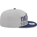 czapka-z-daszkiem-plaskim-szara-i-granatowa-snapback-9fifty-draft-edition-2023-memphis-grizzlies-nba-od-new-era