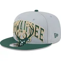 szara-i-zielona-czapka-z-daszkiem-snapback-9fifty-tip-off-2023-milwaukee-bucks-nba-od-new-era