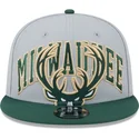 szara-i-zielona-czapka-z-daszkiem-snapback-9fifty-tip-off-2023-milwaukee-bucks-nba-od-new-era