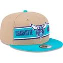 brazowa-i-niebieska-czapka-z-daszkiem-snapback-9fifty-draft-2024-charlotte-hornets-nba-new-era
