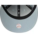 niebieska-czapka-z-plaskim-daszkiem-typu-snapback-z-granatowym-logo-9fifty-original-fit-world-series-new-york-yankees-mlb-od-new