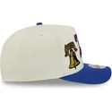 snapback-9fifty-a-frame-precurved-hardwood-classics-philadelphia-76ers-nba-od-new-era-bezowo-niebieska-czapka-z-zakrzywionym-das