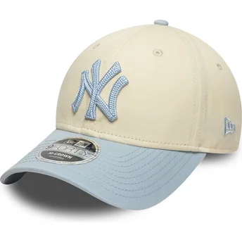 Czapka z zakrzywionym daszkiem beżowo-niebieska snapback z niebieskim logo 9FORTY M-Crown Side Script New York Yankees MLB New Era